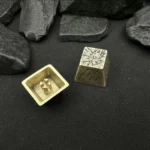 Artistic handcrafted hammered copper keycap, showcasing its unique aged patina finish and rustic texture for vintage keyboards.