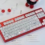 Main display of unique hand-painted PBT keycap set in a sophisticated black theme MOA set, highlighting intricate artistry and personal flair.