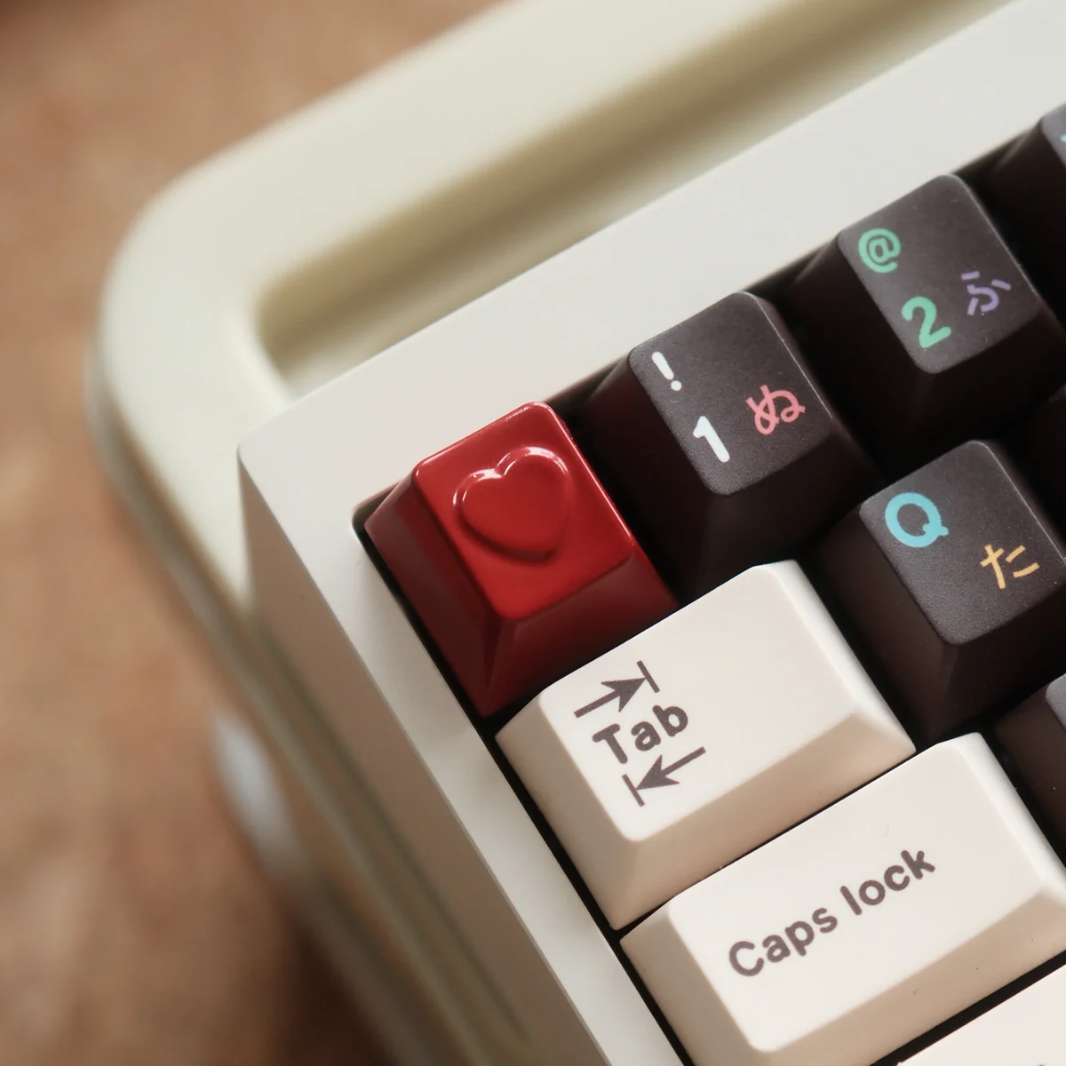 Handcrafted heart keycap, premium aluminum ESC, displayed from multiple artistic angles, emphasizing its polished finish and romantic vibrant design.