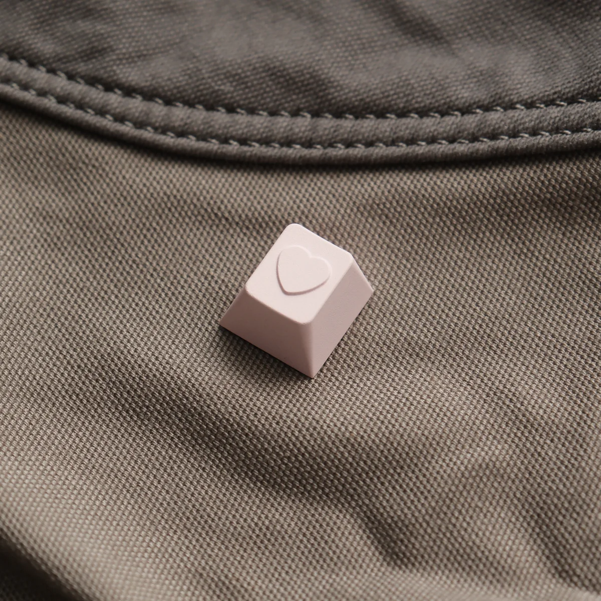 Handcrafted Heart Keycap. Premium polished aluminum ESC, vibrant color, heart motif. Detailed artistic views from all angles.