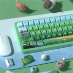 Heidi PBT dye-sublimated keycap set, from multiple views, showcases distinctive Alpine storybook art. It evokes serene, natural beauty.