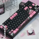 Experience the iconic Hello Kitty PBT keycap set, reimagined in a unique, sweet-yet-edgy black and pink dye-sub style. A playful keyboard upgrade.