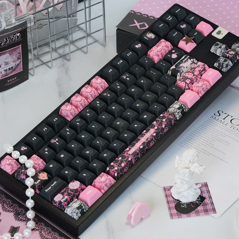 Experience the iconic Hello Kitty PBT keycap set, reimagined in a unique, sweet-yet-edgy black and pink dye-sub style. A playful keyboard upgrade.