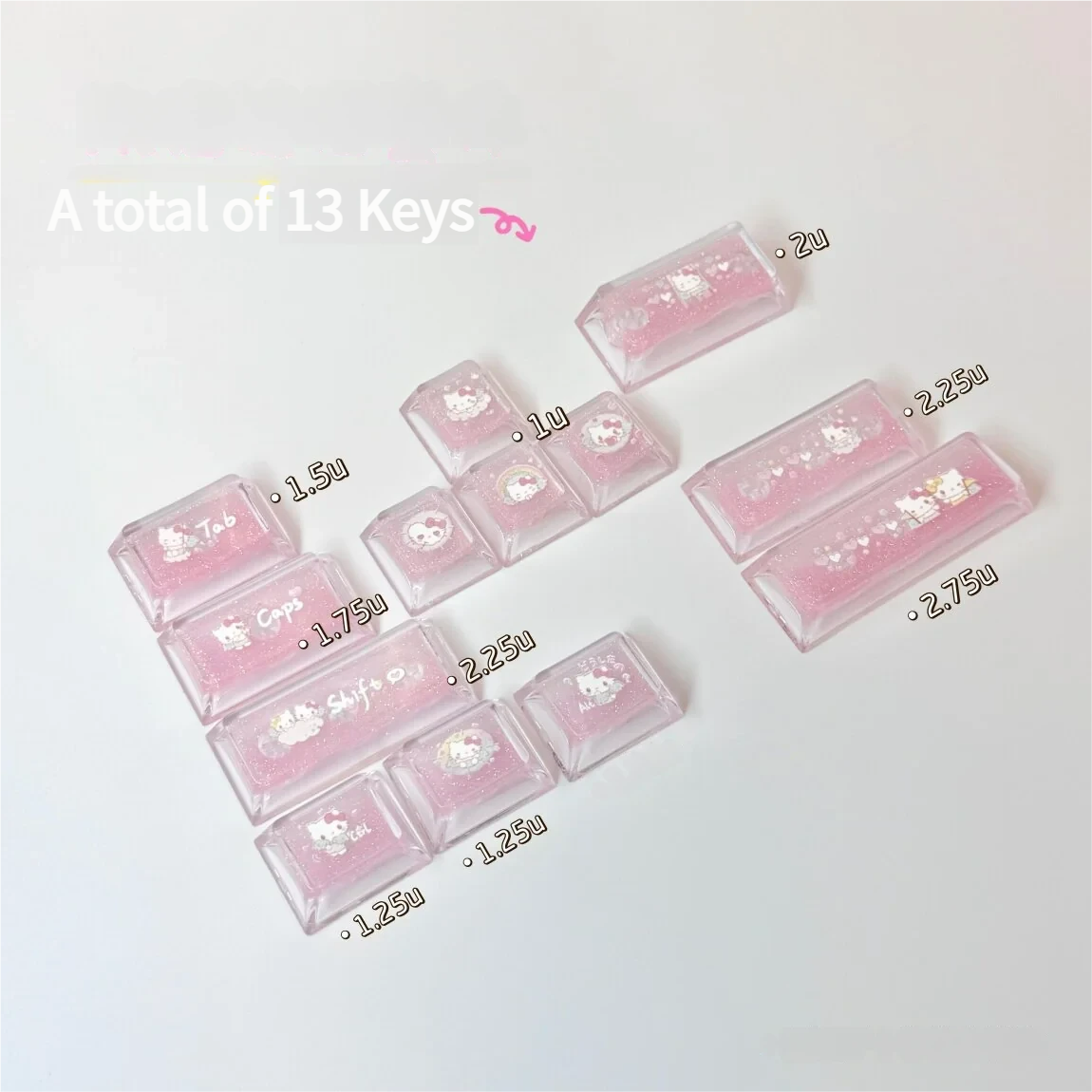 Close-up of a handcrafted Hello Kitty accent keycap, showcasing its vibrant pink and white design and iconic character details from a unique angle.