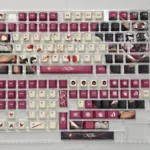 Exclusive Honkai Star Rail Kafka PBT dye-sub keycap set. A close-up reveals the elegant dark character art and mysterious symbols, highlighting its premium design.