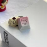 Side view of the handcrafted aluminum ice cream keycap, showcasing its whimsical vibrant colors, playful artisan design, and premium polished metallic design.