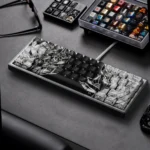 Exclusive Berserk side-lit PBT keycaps set, shown from various angles, reveal gritty dark fantasy art and subtle backlit legends. Ideal for immersive gaming setup.