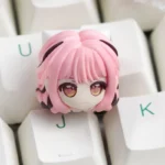 Artistic Infinity Nikki artisan resin ESC keycap, captured from a new angle. Features whimsical game character design with vibrant colors and delicated design.