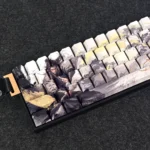Jinxian side-engraved backlit PBT keycap set gallery, showcasing luminous side-lit legends and mythical Chinese artistry from various premium angles.