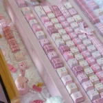 A captivating product gallery showcasing the Premium PBT Dye-Sub JK Girl Keycap Set from multiple angles, highlighting its charming pastel aesthetic.