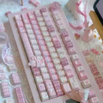 Gallery views of the Premium PBT Dye-Sub JK Girl Keycap Set, with its charming pastel JK uniform aesthetic and playful custom motifs for keyboards.