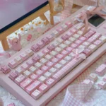 Charming JK Girl Keycaps Set: a premium PBT dye-sub set showcasing pastel uniform designs and playful custom motifs, perfect for a unique mechanical keyboard.