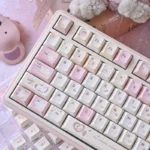 Detailed view of the whimsical Karami PBT dye-sub keycaps set, revealing unique character artistry and soft, delightful hues for a custom keyboard.