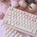 Whimsical Karami PBT dye-sub keycaps set, displaying unique character designs and soft hues from multiple angles for a delightful keyboard.