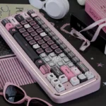 Close-up of the adorable lace cat PBT MAO keycap set, highlighting its charming black and pink design, delicate lace patterns, and durable dye-sub PBT.