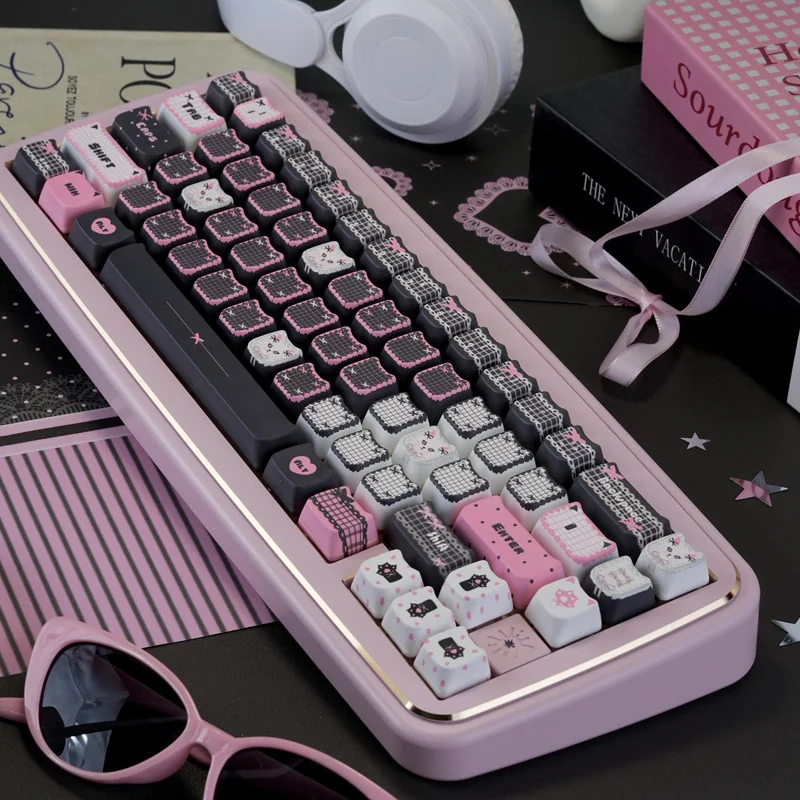 Close-up of the adorable lace cat PBT MAO keycap set, highlighting its charming black and pink design, delicate lace patterns, and durable dye-sub PBT.