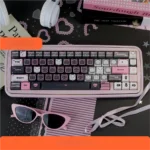 Charming black and pink lace cat keycap for mechanical keyboards, featuring a playful design and durable PBT dye-sub craftsmanship.