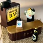 Close-up of a whimsical lake blue cat paw keycap, crafted from premium CNC aluminum, emphasizing its charming detail and playful aesthetic for mechanical keyboard.