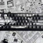 Iconic Levi Ackerman PBT side-lit keycaps for 68-key tactical setups, showcasing durable, dark-themed legends ideal for backlighting.