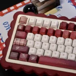 Light and Night Evan Dye-Sub PBT Keycaps Set. Close-up reveals exclusive ethereal celestial art, character designs, and the artistic blend of light.