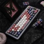 Detailed views of the exclusive Light Night Osborn character PBT keycap set, showcasing its vibrant fantasy aesthetic and romantic anime art from multiple angles.