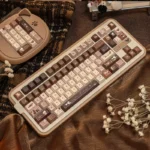 Literary Keycap Set: PBT dye-sublimated Cherry profile. Multiple views capture its nostalgic, scholarly, book-inspired aesthetic, with muted artistic design.