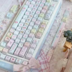 Charming 'Little Girl' PBT keycap set, featuring whimsical, innocent designs from various artistic angles, perfect for custom mechanical keyboards.