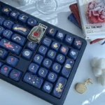 Enchanting Little Prince PBT Dye-Sub Keycap Set, viewed from a captivating angle, revealing whimsical illustrations, delicate pollen motifs, and dreaming design.