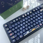 An enchanting Little Prince PBT Dye-Sub Keycap Set, showcasing whimsical journey motifs, delicate pollen designs, and soft, dreamy hues from multiple angles.