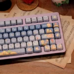Detailed views of the enchanting Little Prince Starry PBT MOA profile keycaps set, featuring whimsical cosmic journey illustrations from various artistic angles.