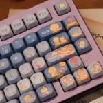 Enchanting Little Prince Starry PBT keycaps set, MOA profile, displayed from multiple angles, showcasing whimsical starry night and cosmic journey illustration.