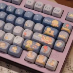 Little Prince Starry PBT keycaps set, MOA profile, displayed from various angles. Features whimsical starry night illustrations and cosmic journey art.