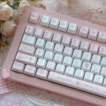 Close-up of the Love Alarm PBT Dye-sub Keycaps Set, showcasing the romantic pastel colors and unique heart motifs from various angles, perfect for a whimsical artistic.