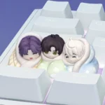 Exclusive Love Deepspace resin artisan keycap, showing the intricate cozy bed scene sculpture. A detailed view highlights the game-inspired artistry.