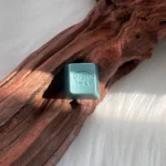 Precision CNC Maltese Dog keycap gallery. Diverse artistic angles reveal the minimalist Maltese, showcasing modern elegance.