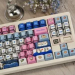 Detailed views of the Whimsical Manga Cowboy Cat PBT Keycap Set, showcasing vibrant manga cat keycaps with playful cowboy designs and unique artistic angles.