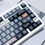 Detailed views of the Medieval Astrolabe Dye-Sub PBT Keycap Set, highlighting its intricate celestial maps and ancient astronomical instrument design.