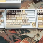 Whimsical Meow Cafe PBT Keycap Set gallery shows premium dye-sub PBT keys; vibrant cat art from all angles highlights playful modern aesthetic.