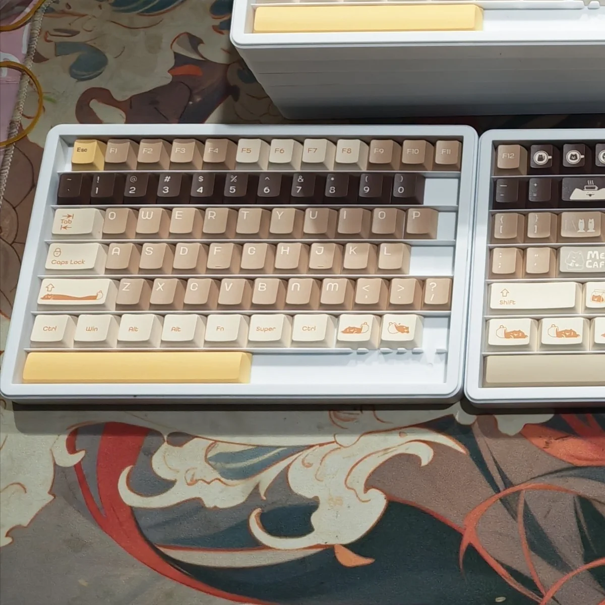 Whimsical Meow Cafe PBT Keycap Set displayed, featuring vibrant, full dye-sub feline designs on premium PBT material for a playful keyboard.