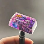 Detailed shot of the handcrafted Mewtwo & Mew resin keycap from a unique angle, capturing the dynamic psychic energy and vibrant translucent artistry.