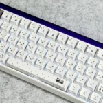 A delightful Miffy PBT keycap set, showcasing individual translucent side-printed keycaps from various angles, highlighting their playful glow and durable PBT.