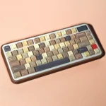 Cozy Milk Coffee PBT Keycaps set, beautifully arranged to showcase their warm, creamy aesthetic and durable comfort, evoking a premium coffee shop.
