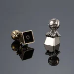 Handcrafted mummy keycap, an ancient Egyptian artifact. Detailed gallery views from multiple angles highlight its intricate sculpting design.