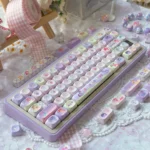 Main image of the exclusive My Little Pony MOA PBT keycap set, showcasing vibrant, whimsical characters on a unique MOA profile.