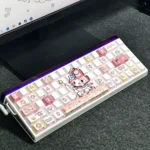 A playful My Melody PBT doubleshot backlit keycap set, showcasing a vibrant side view of its clean, side-printed, glowing pastel pink legends.