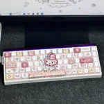 Close-up of the whimsical My Melody PBT doubleshot backlit keycap set, highlighting its unique side-printed legends and playful pastel pink aesthetic.