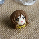 Close-up of the exclusive Kamisama Kiss Nanami Momozono artisan keycap from a different angle, showcasing its vibrant, charming anime aesthetic.