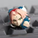 Naruto: Gritty Sakura Haruno Keycap, showcasing vibrant resin character details from a unique angle, embodying Sakura's artistic spirit.