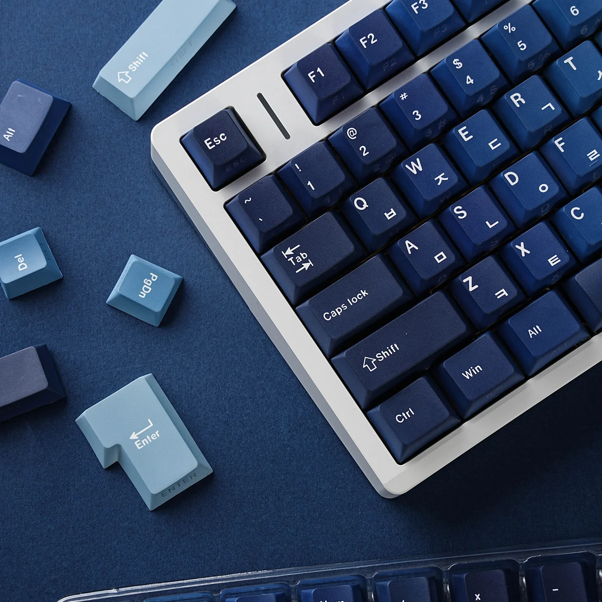 Premium Ocean Heart PBT keycap set, showcasing deep ocean blues, pristine, and durable legends. Captivating aquatic motifs create a serene aesthetics.