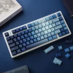 Ocean Heart PBT Keycap Set. Premium PBT keycaps in deep ocean blues, pristine, and aquatic motifs, creating a captivating aesthetic.